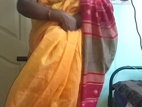 desi indian sizzling tamil telugu kannada malayalam hindi cheating wife vanitha debilitating orange colour saree showing big boobs and shaved pussy press hard boobs press nip rubbing pussy masturbation xxx mallu reel